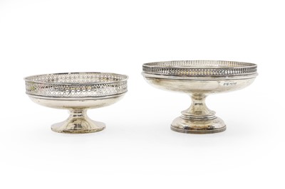 Lot 16 - A near pair of silver pedestal dishes