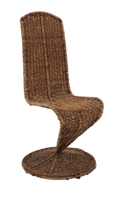 Lot 571 - A banana leaf 'S' chair