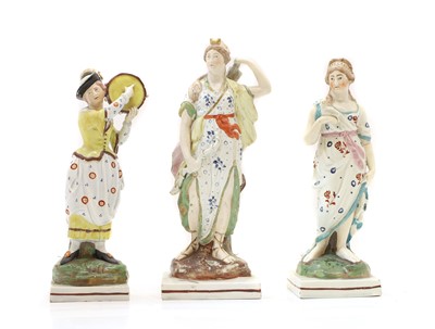 Lot 93 - Three Staffordshire pottery figures