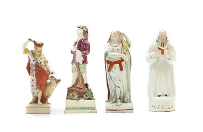 Lot 97 - Four Staffordshire pottery figures