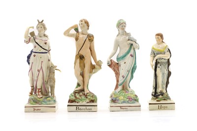 Lot 88 - Four creamware Staffordshire pottery figures
