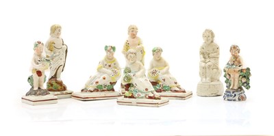 Lot 86 - A group of eight Staffordshire pottery figures