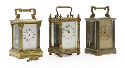 Lot 153 - Three brass carriage clocks