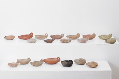 Lot 377 - A group of Roman terracotta oil lamps