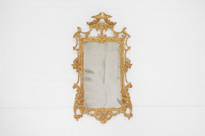 Lot 492 - A George III-style carved giltwood pier mirror