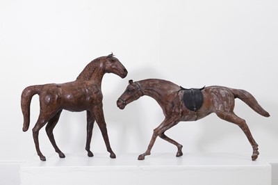 Lot 518 - Two leather horses