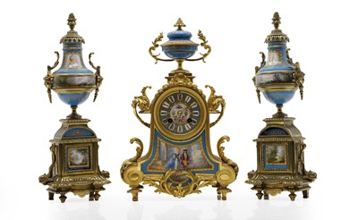 Lot 149 - A French gilt metal and porcelain three piece clock garniture