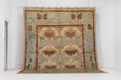 Lot 132 - A wool carpet of Arts & Crafts design