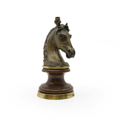 Lot 306 - A patinated bronze lamp