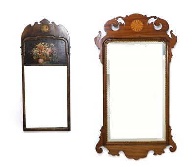 Lot 449 - A George II style fret carved mahogany and parcel gilt mirror