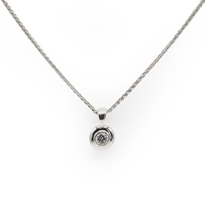 Lot 1052 - An 18ct white gold diamond single stone pendant on chain