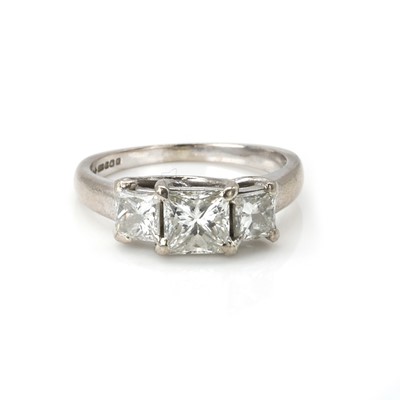 Lot 1051 - An 18ct white gold diamond three stone ring