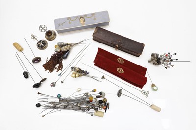 Lot 207 - A collection of hat pins
