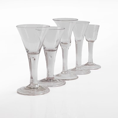Lot 158 - A group of five plain stem wine glasses