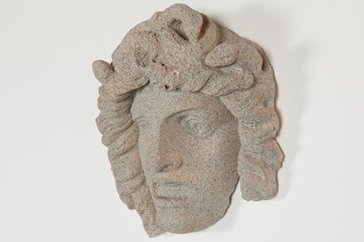 Lot 434 - A pink plaster mask of Medusa