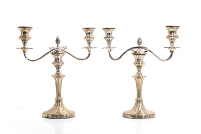 Lot 35 - A pair of silver candelabra