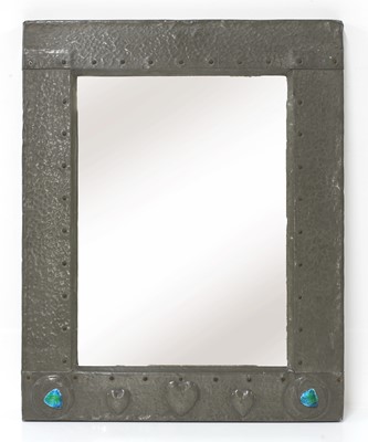 Lot 495 - An Arts and Crafts pewter mirror