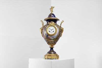 Lot 212 - An ormolu-mounted porcelain mantel clock