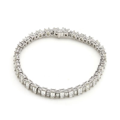 Lot 231 - A platinum and diamond line bracelet