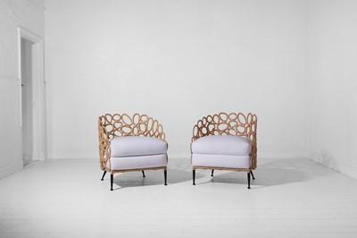 Lot 551 - A pair of rattan 'Ella' lounge chairs by Paolo Moschino