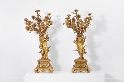 Lot 146 - A pair of Louis XVI-style ormolu candelabra