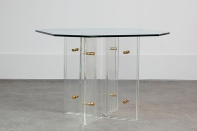 Lot 339 - A Lucite and glass table