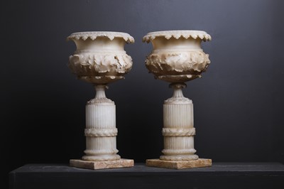 Lot 55 - A pair of Victorian alabaster urns