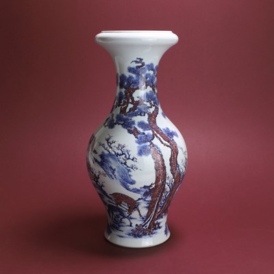 Lot 69 - A Chinese copper-red and underglaze blue vase