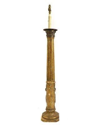 Lot 473 - A carved giltwood torchere lamp