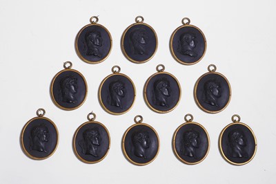 Lot 167 - A set of twelve Wedgwood black basalt medallions