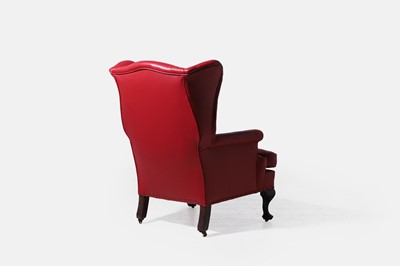Lot 521 - A Queen Anne-style mahogany wing armchair