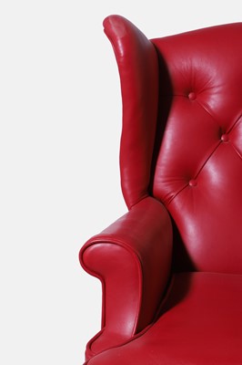 Lot 521 - A Queen Anne-style mahogany wing armchair