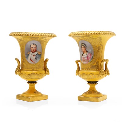 Lot 220 - A pair of Sèvres style yellow ground twin handled vases