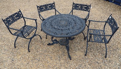 Lot 479 - A faux cast iron garden suite