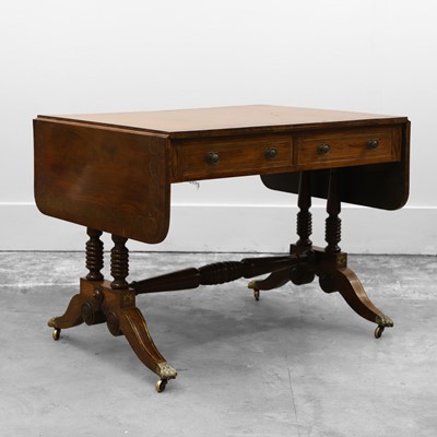 Lot 527 - A Regency rosewood and brass inlaid sofa table