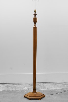 Lot 471 - A walnut standard lamp