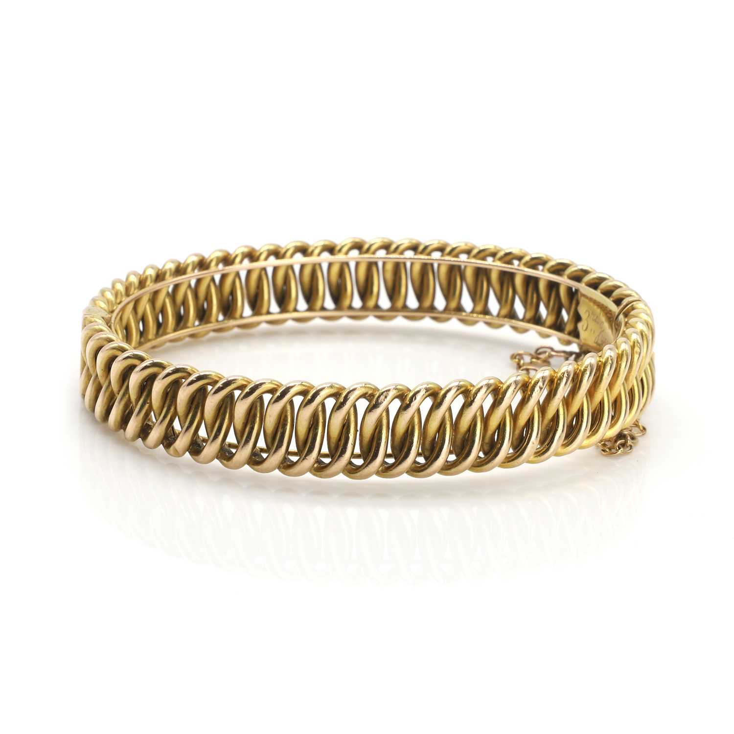 Lot 27 - A late Victorian hinged bangle