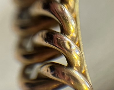 Lot 27 - A late Victorian hinged bangle