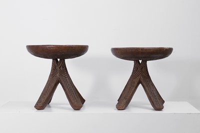 Lot 502 - A pair of carved Igbo stools