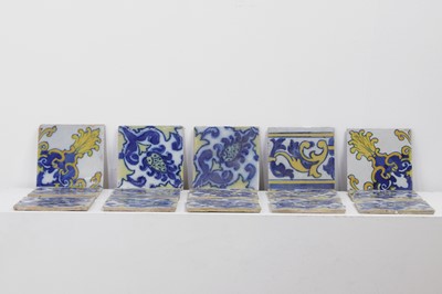 Lot 102 - A collection of tin-glazed tiles