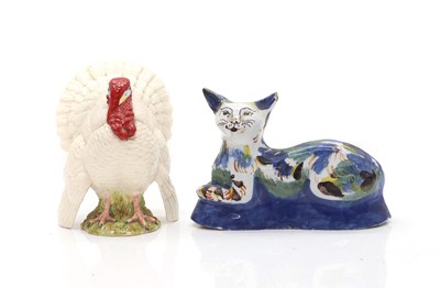 Lot 53 - A faience pottery cat