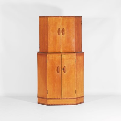 Lot 519 - An Art Deco style walnut-veneered drinks cabinet