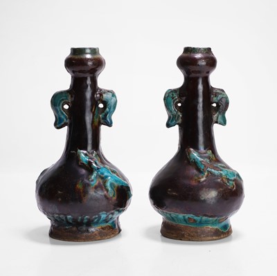 Lot 360 - A pair of Chinese fahua-type garlic vases