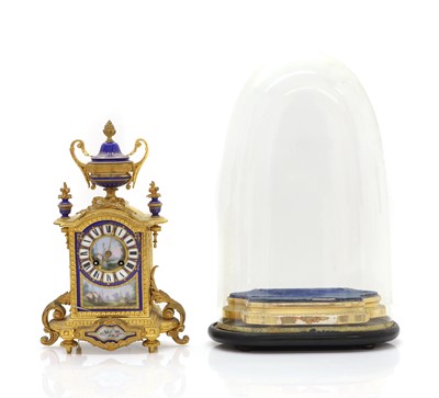 Lot 206 - A French ormolu and painted porcelain mantel clock