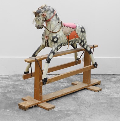 Lot 320 - A painted rocking horse