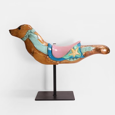 Lot 144 - A fairground galloper, carved and painted as a seal