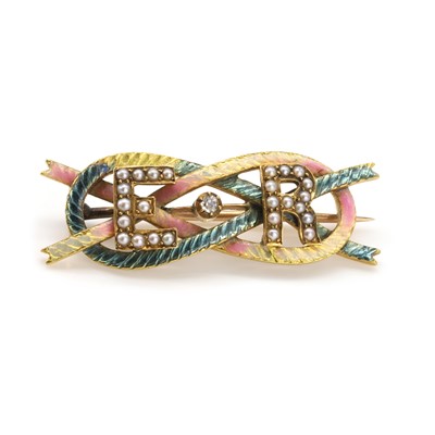 Lot 256 - An enamel, split pearl and diamond cypher brooch