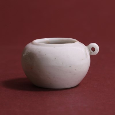 Lot 276 - A Chinese qingbai-glazed bird feeder