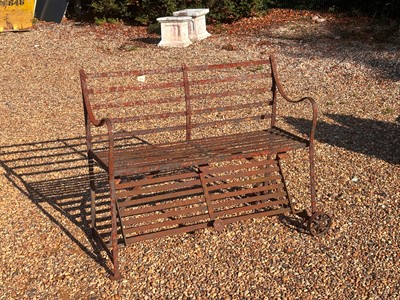 Lot 552 - A Victorian wrought iron garden bench