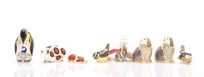 Lot 107 - A collection of Crown Derby paperweights